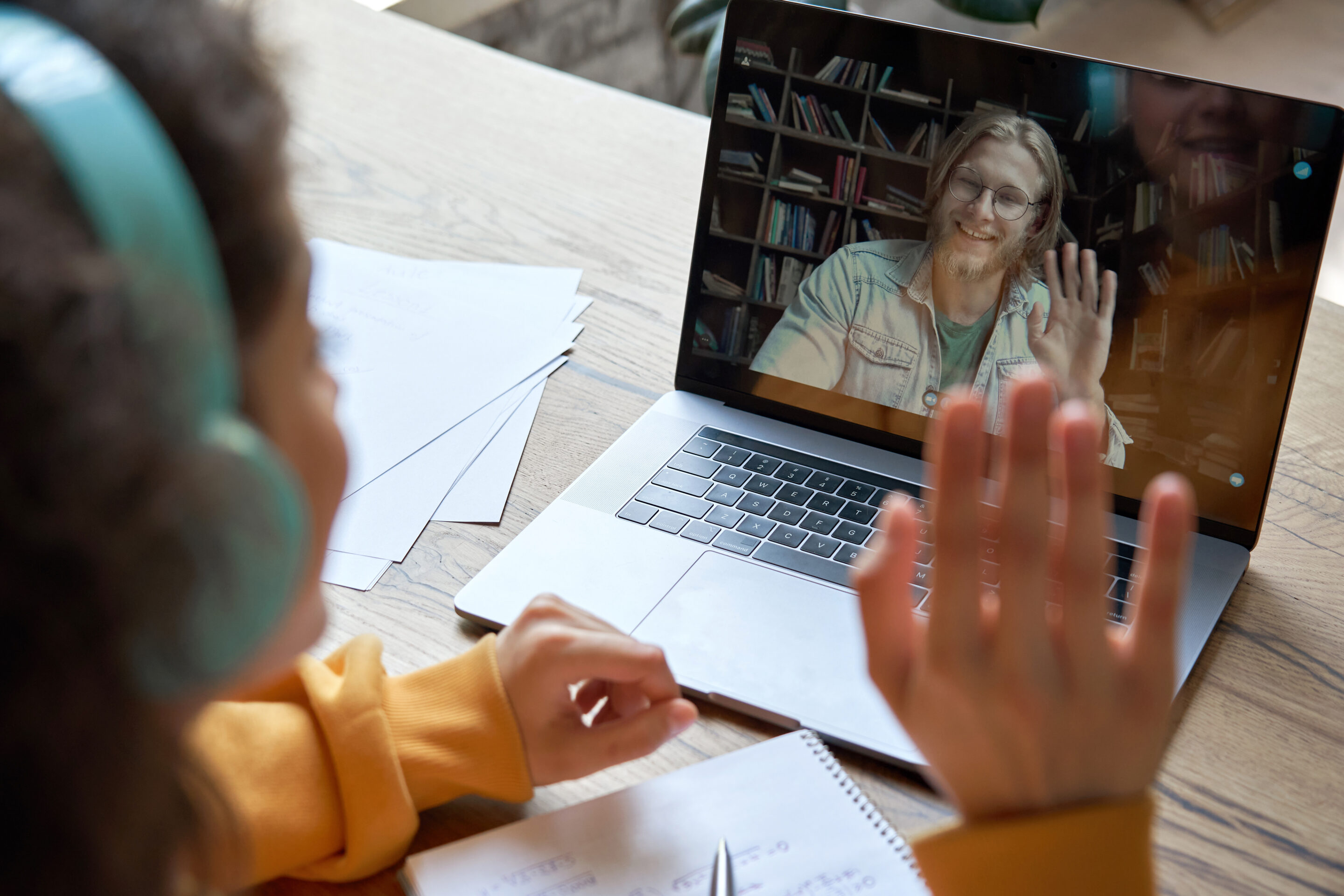 Hispanic,Teen,Girl,School,College,Student,Distance,Learning,Waving,Hand e-learning telelangue